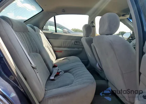 1999 Buick Century Custom z USA, uszkodzony, nr VIN 2G4WS52M3X1584454